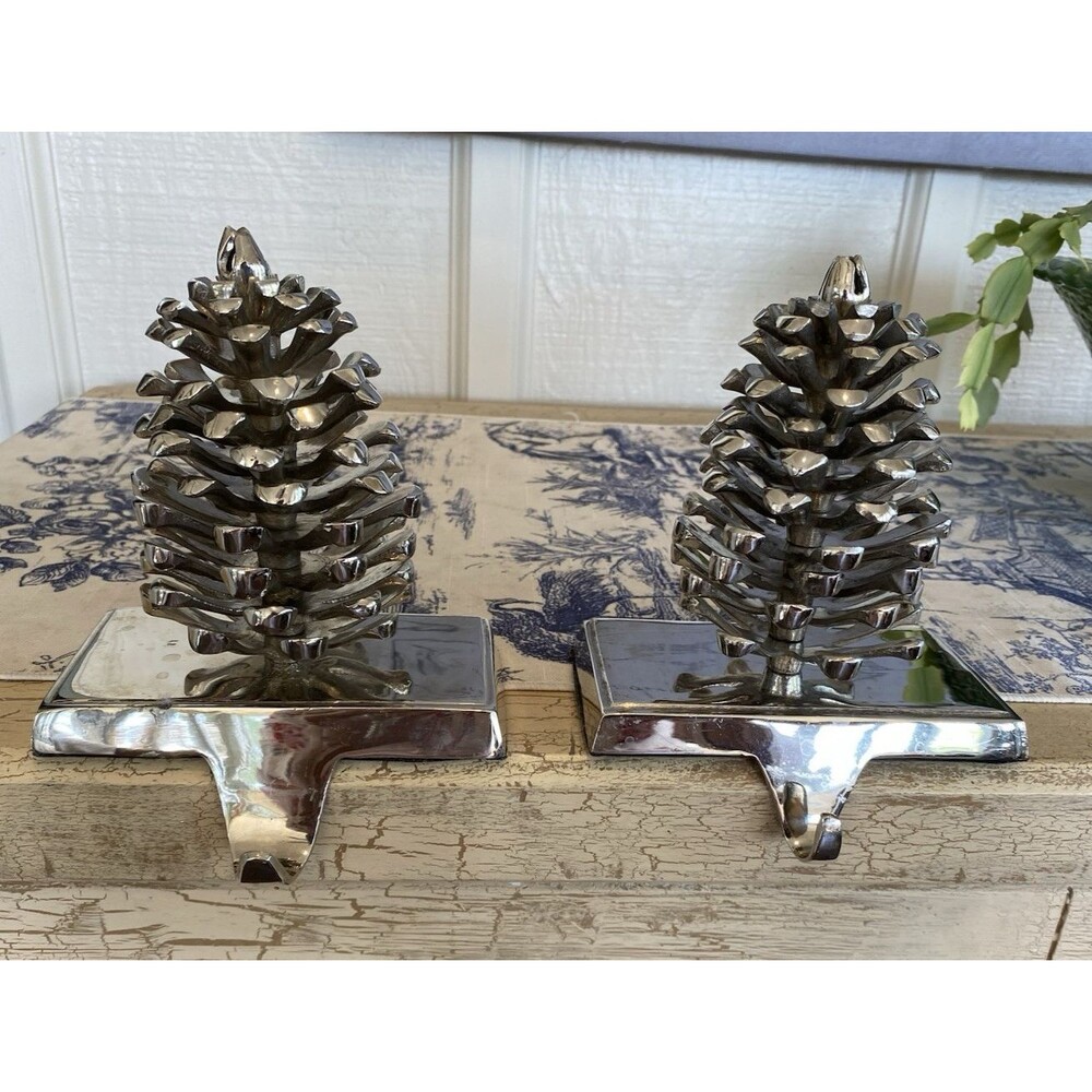 Pair Silver Tone Heavy Pinecone Christmas Mantel Stocking Holders Cast Iron?